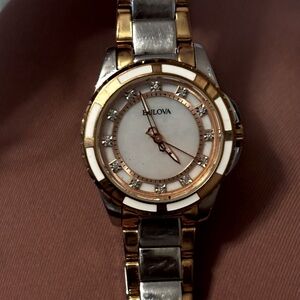 Women’s Bulova Diamond with Pearl white back..
